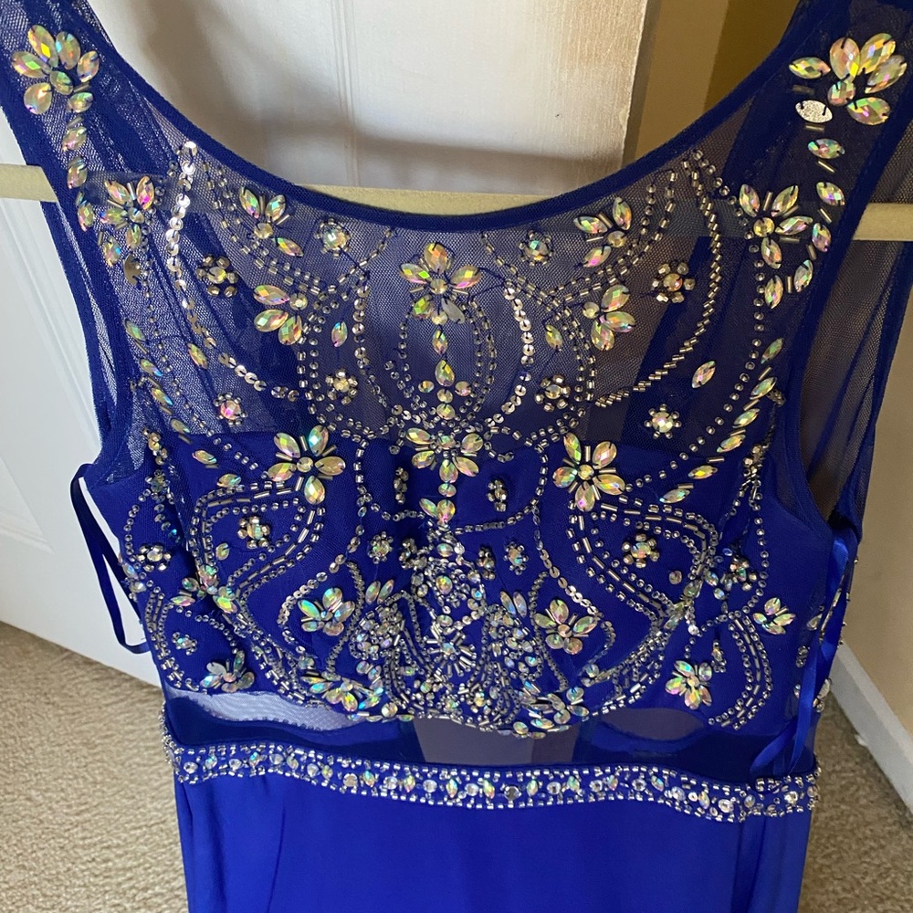 Dress… fancy blue evening dress.
